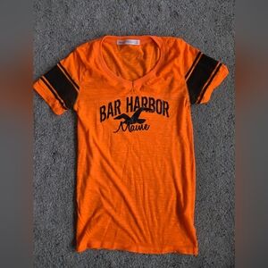 Orange Graphic Tee with Black Accents